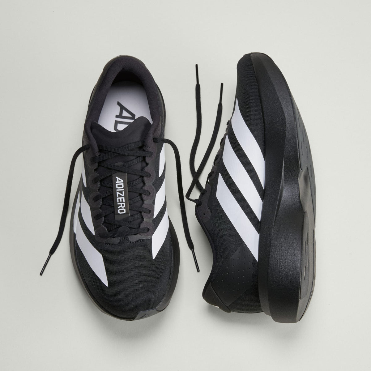 ADIDAS ADIZERO EVO SL Noir / Blanc