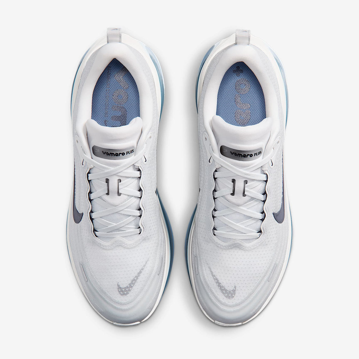 Nike Vomero Plus Blanc cassé / Gris