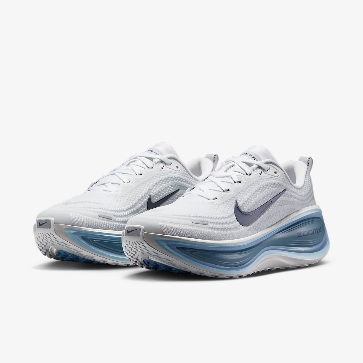Nike Vomero Plus Blanc cassé / Gris