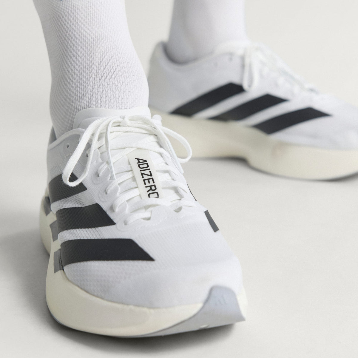 ADIDAS ADIZERO EVO SL Blanc / Noir