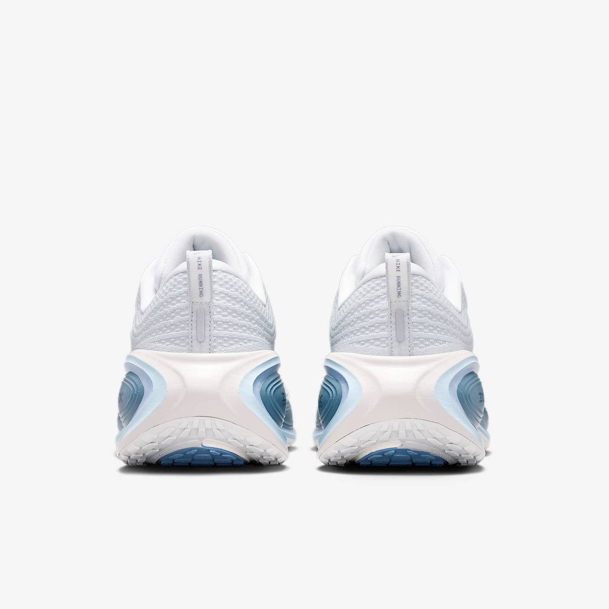 Nike Vomero Plus Blanc cassé / Gris
